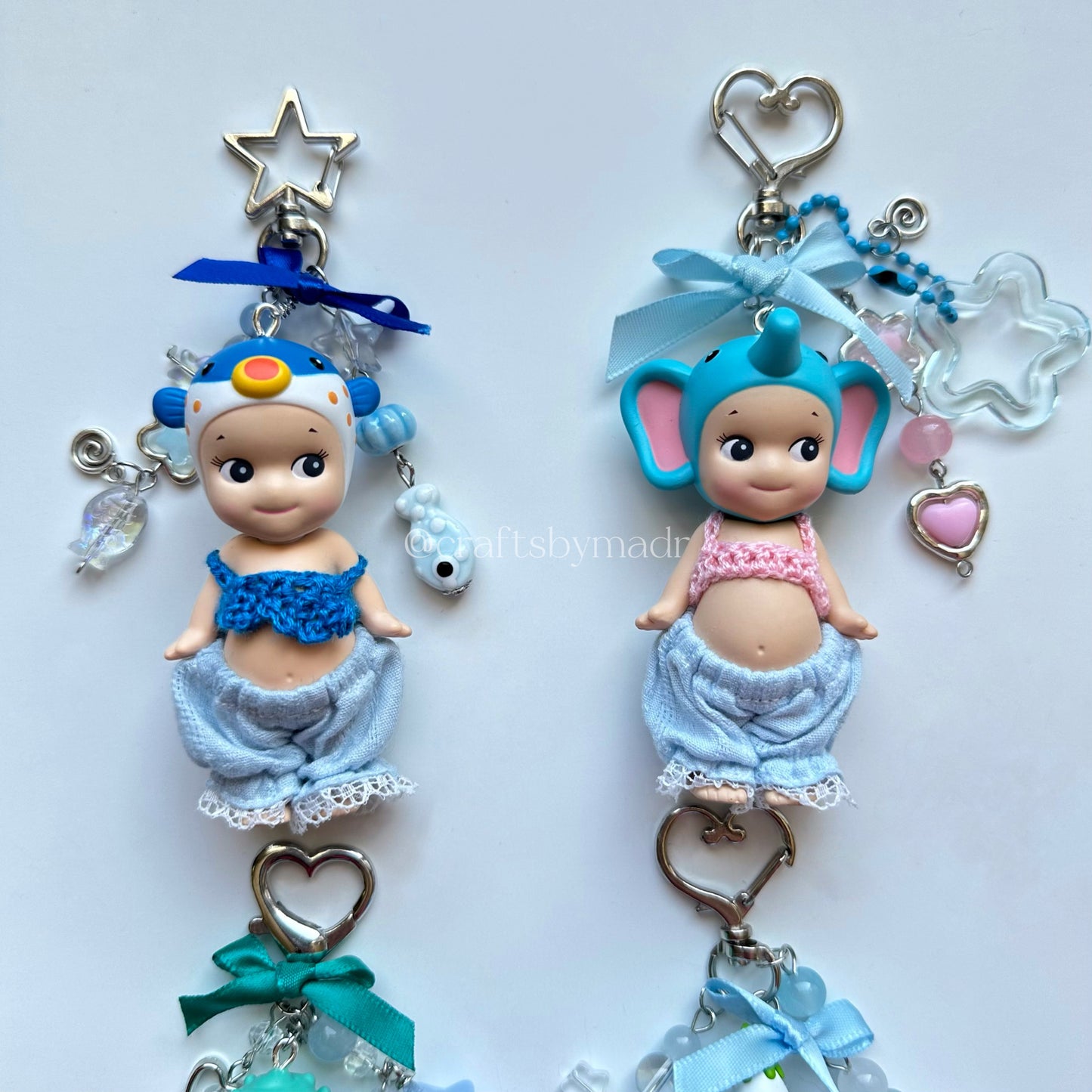 blue sonny angel keychains with crochet tops and blue pants